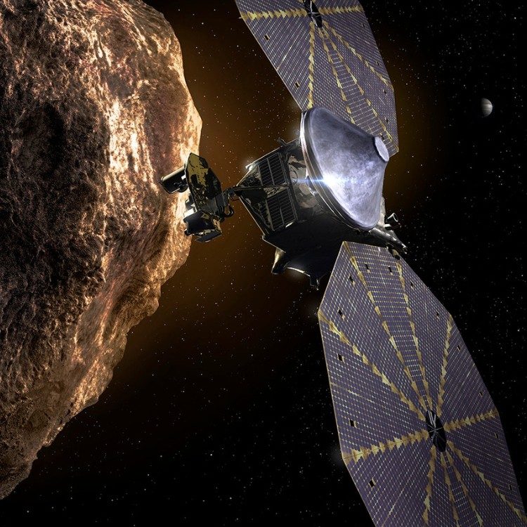Lucy spacecraft flying by a Trojan asteroid